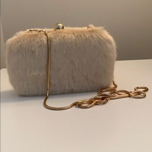 Marciano faux fur clutch with chain